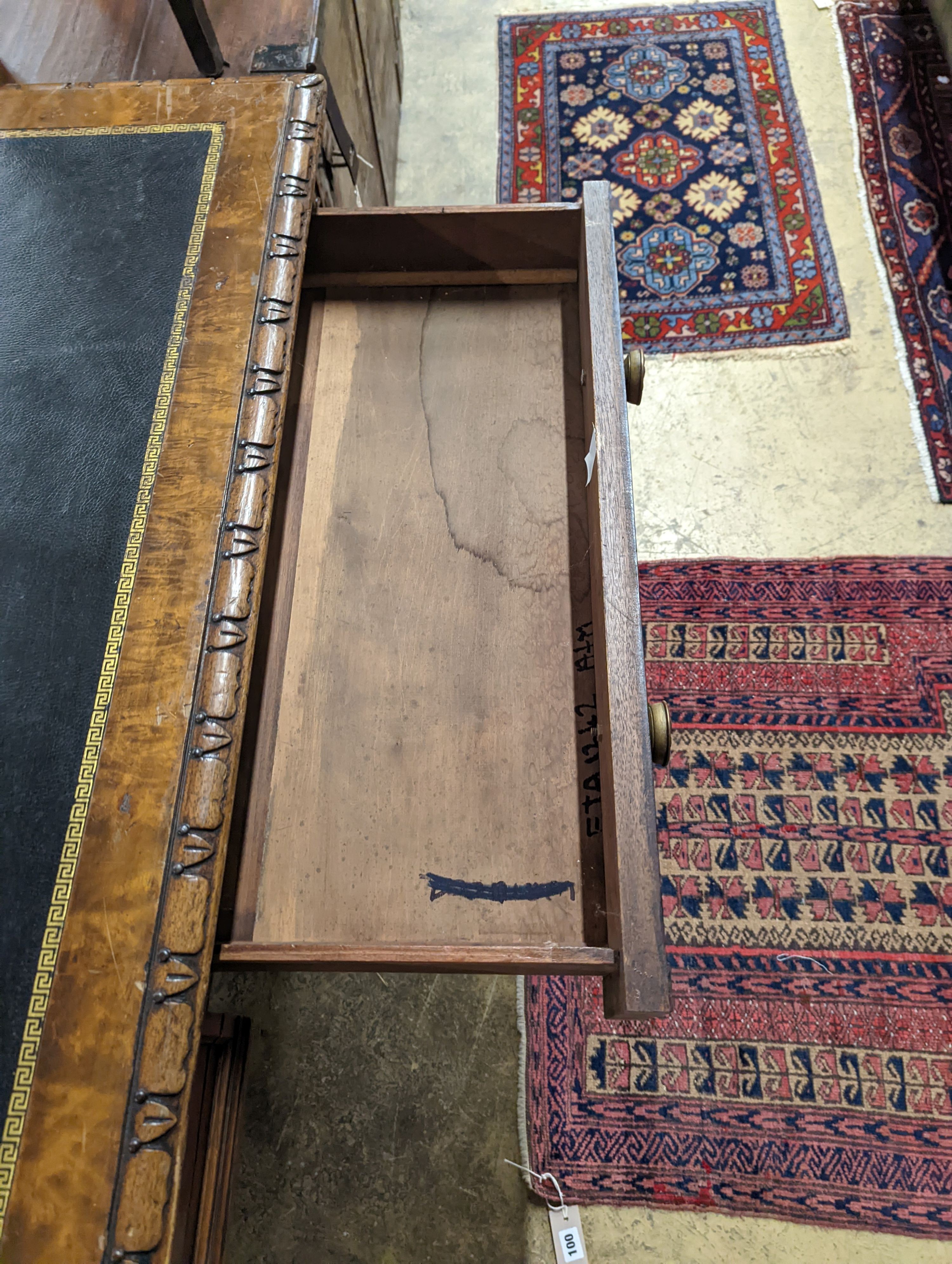 A Victorian Gothic style walnut two drawer library table, width 152cm, depth 78cm, height 76cm